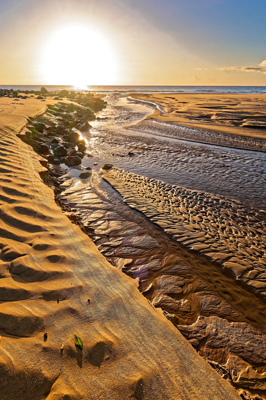 Abstract natural aqua water sculpture formed by wind and waves at dawn