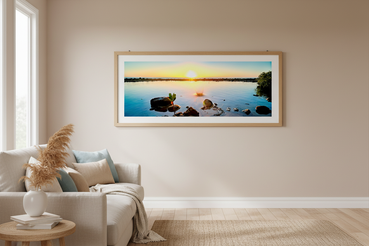 Dawn Ripples panoramic fine art print framed on wall in coastal living room