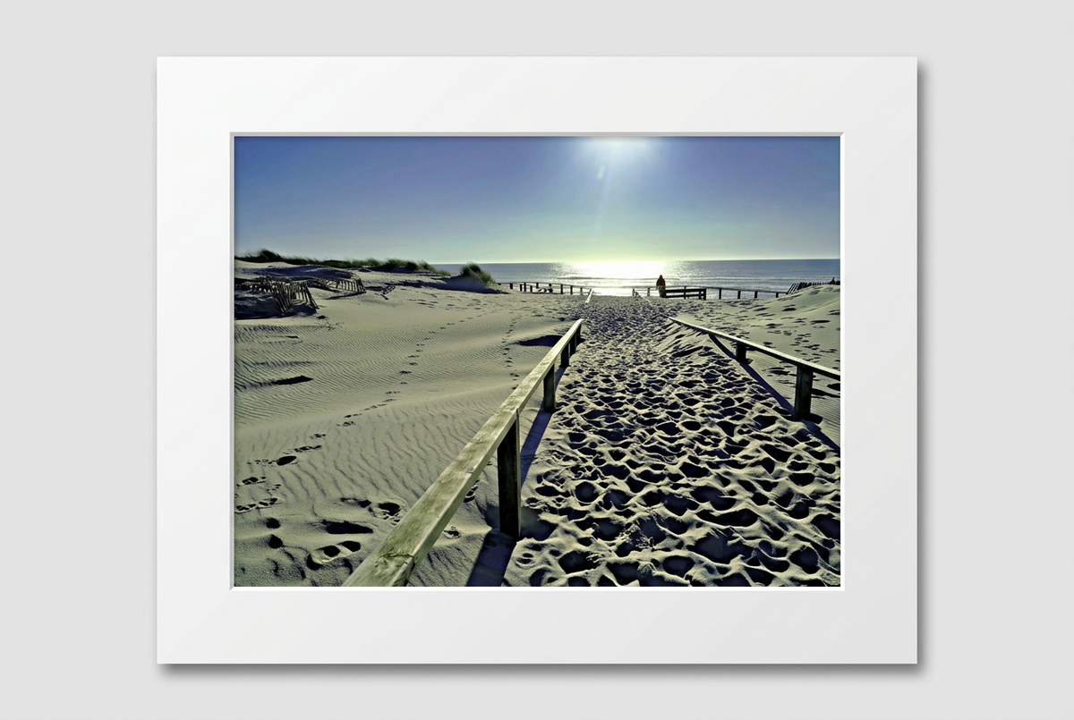 Sandy Sun beach photography print presented with a white mat board and no outer frame.
