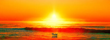 Sun breaking through morning mist at Mudjimba Beach Sunshine Coast