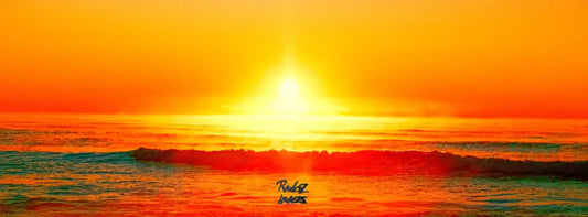 Sun breaking through morning mist at Mudjimba Beach Sunshine Coast